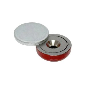 a round metal object with a round lid